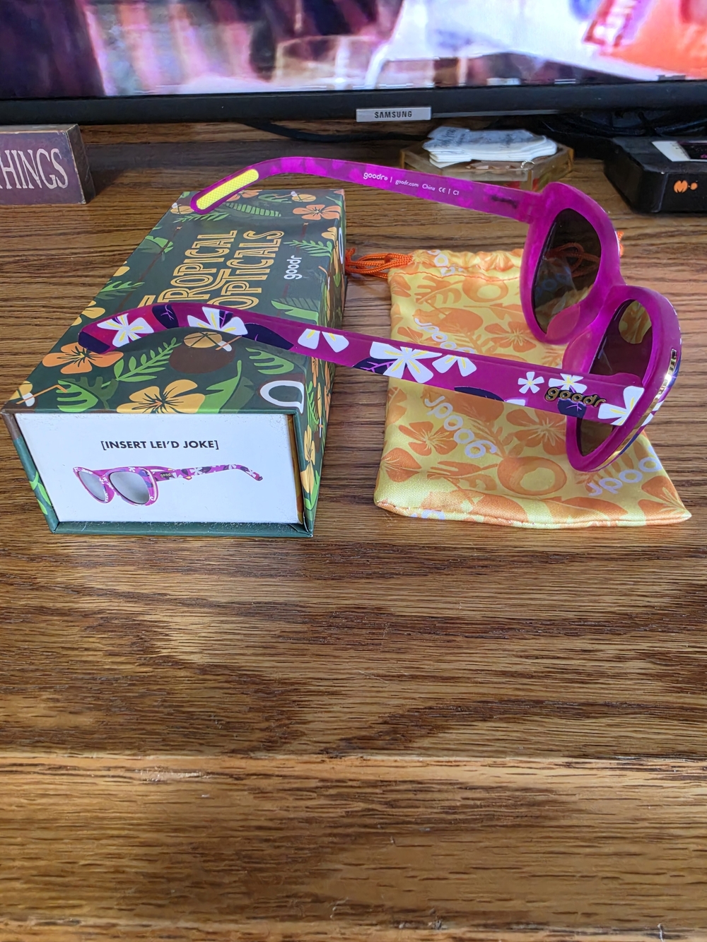 Goodr "Insert Lei'd Joke" Pink Floral Sunglasses